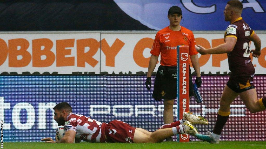 Wigan Warriors player Abbas Miski scores his second try against Huddersfield Giants