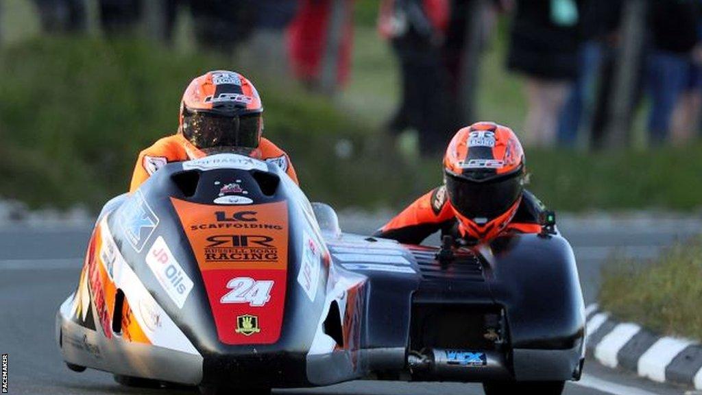 Michael Russell and passenger Vicky Cooke in action in their sidecar