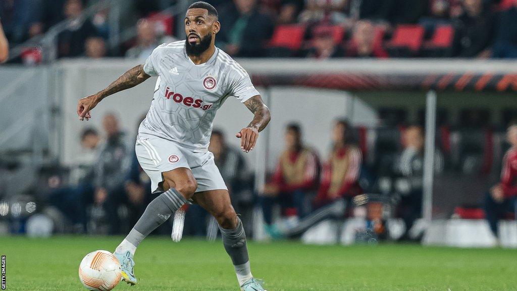 Yann M'Vila in action for Olympiacos