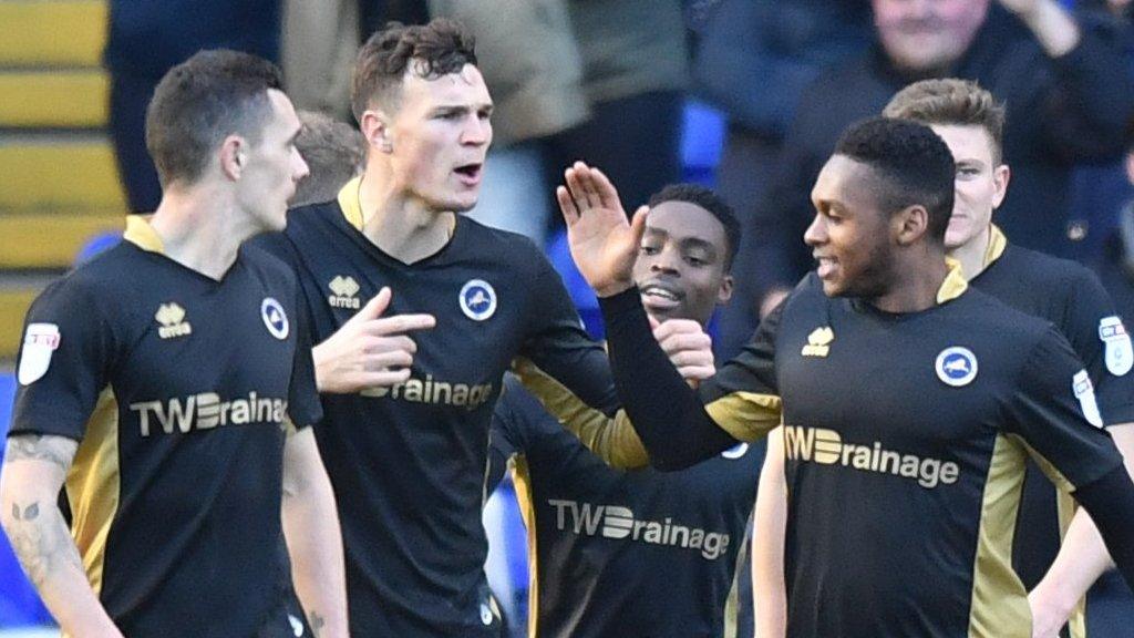 Millwall celebrate their winner at Birmingham