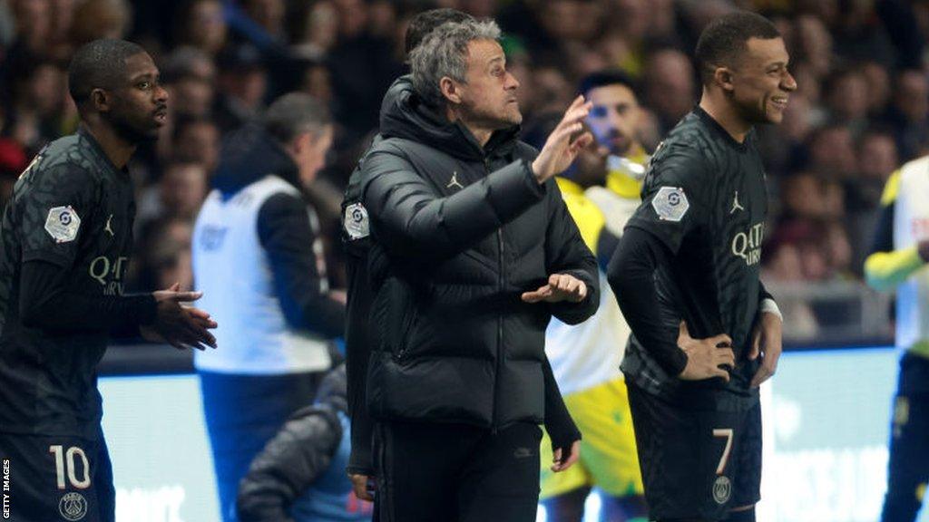 Luis Enrique gestures during a PSG match