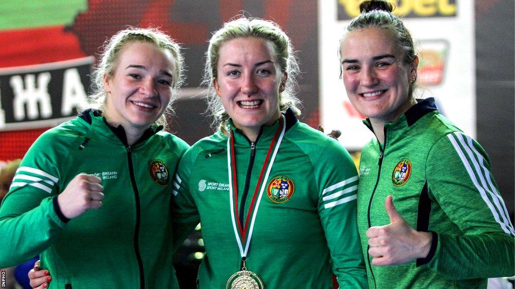 Amy Broadhust, Christina Desmond and Kellie Harrington celebrate winning gold medals at the tournament