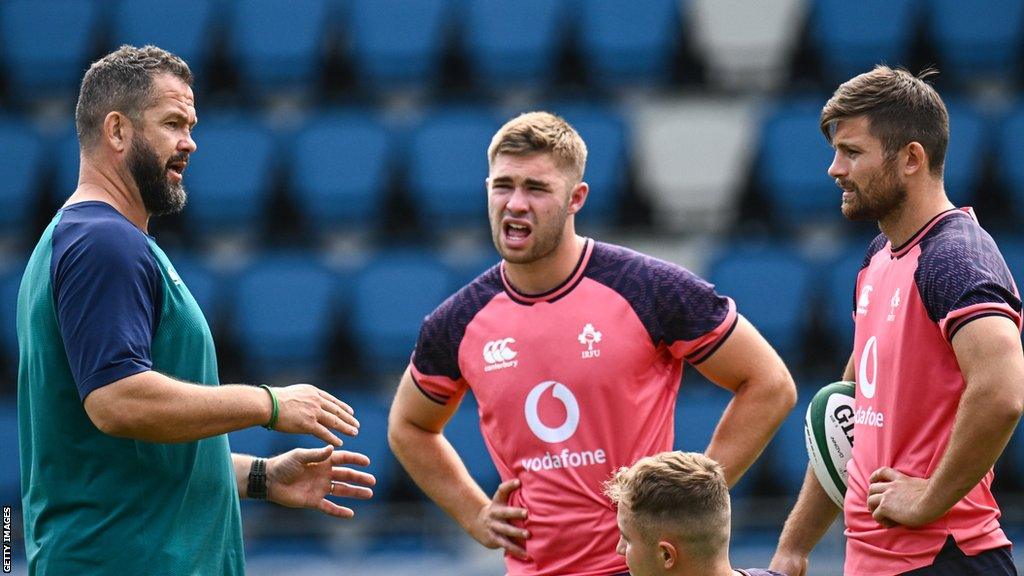 Ireland head coach Andy Farrell speaks with Jack Crowley, Ross Byrne and Craig Casey during a training session