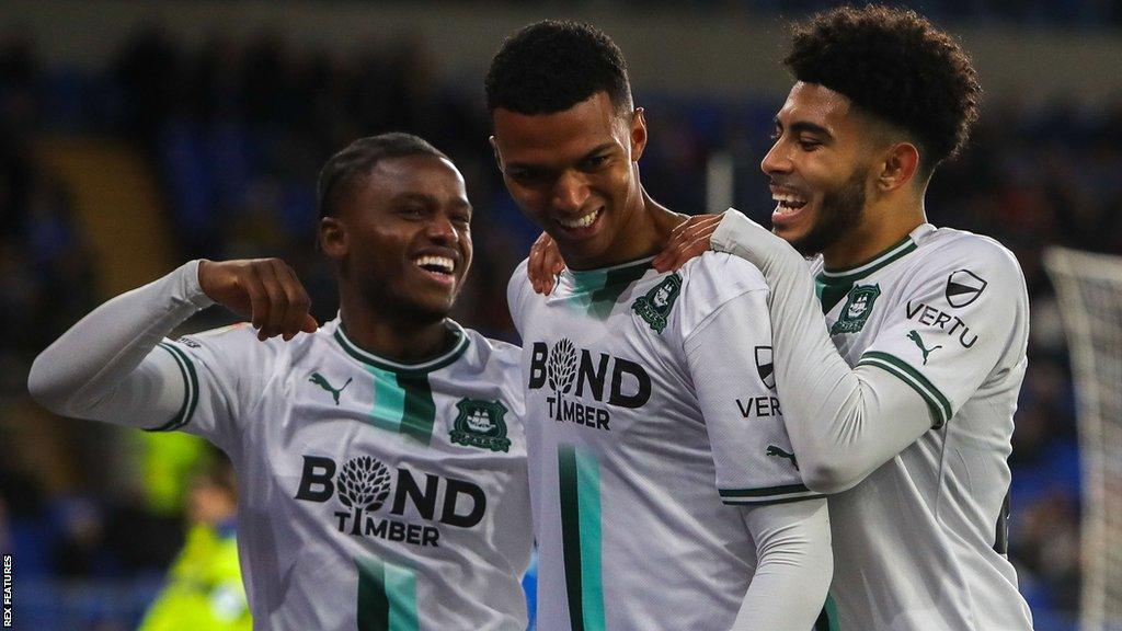 Morgan Whittaker (centre) celebrates his second goal