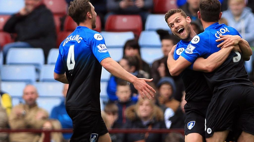 Steve Cook celebrates