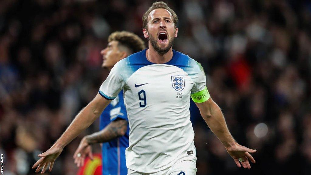 England captain Harry Kane celebrates scoring against Italy in Euro 2024 qualifying