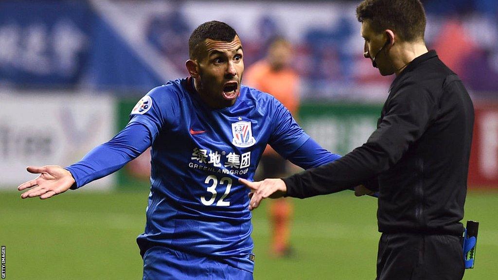 Carlos Tevez argues with the referee in a match against Brisbane Road