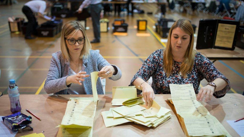 People counting votes in Cardiff