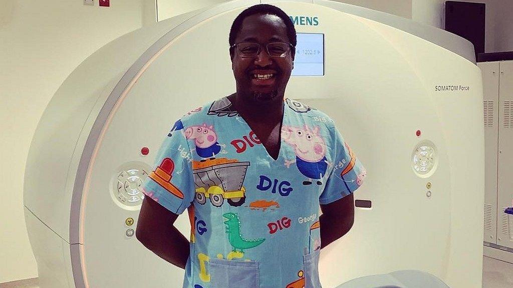 Kevin Kimani in Peppa Pig scrubs