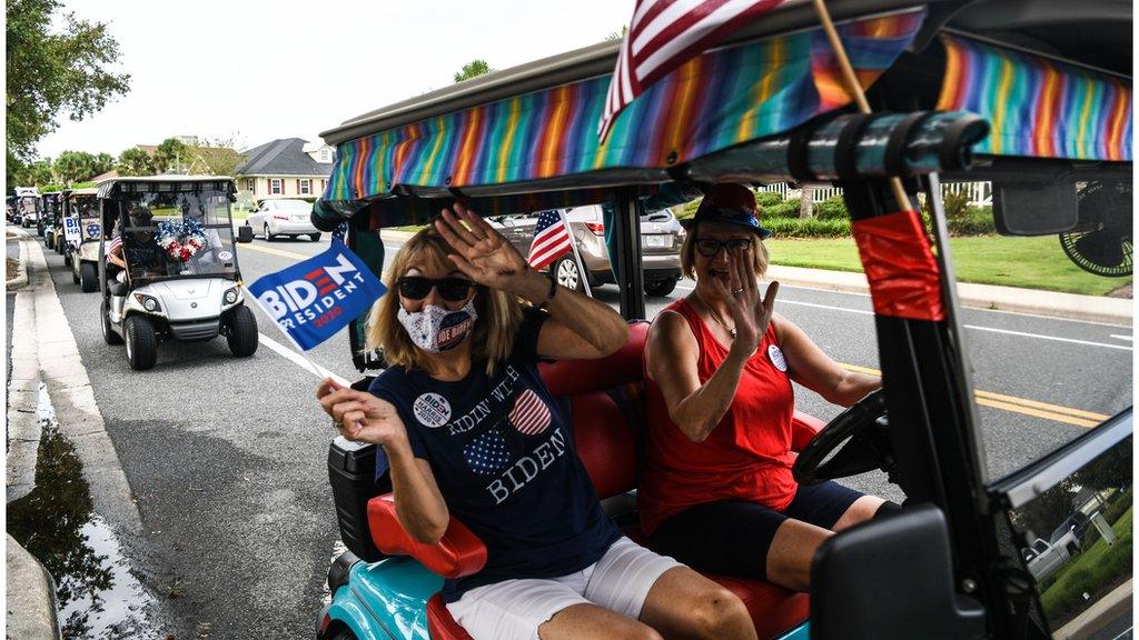 Older voters at "The Villages" hold a pro-Biden parade in golf carts