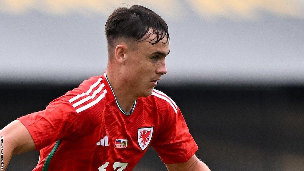 Luke Harris in action for Wales Under-21s