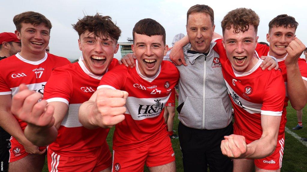 Martin Boyle and the Derry players celebrate their Ulster Minor final win over Monaghan in 2021