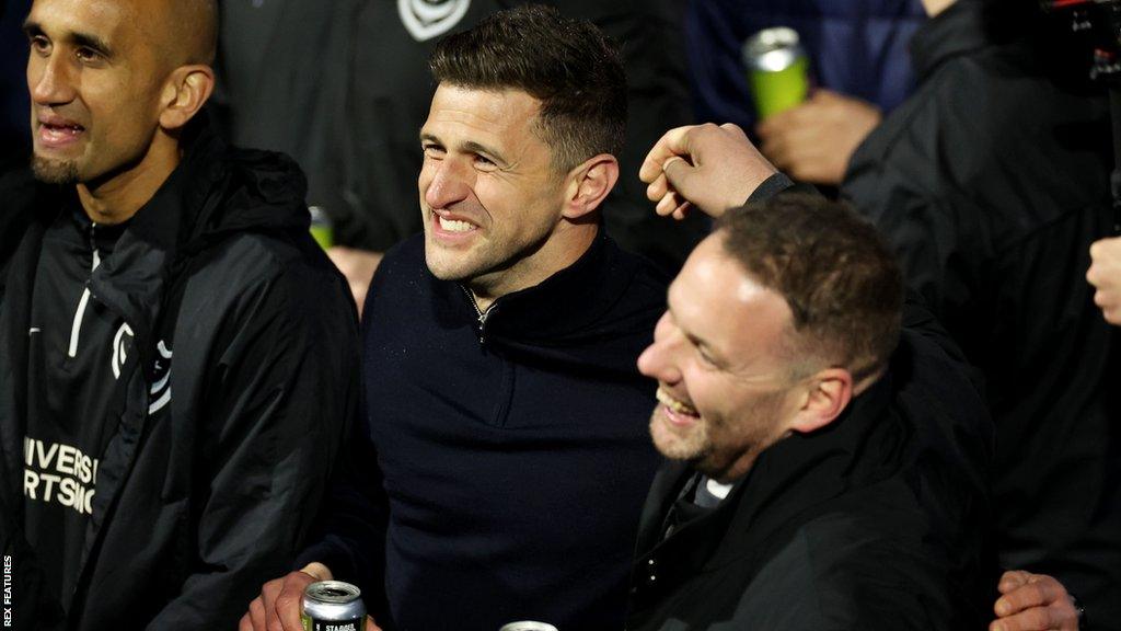 Portsmouth boss John Mousinho celebrates their promotion