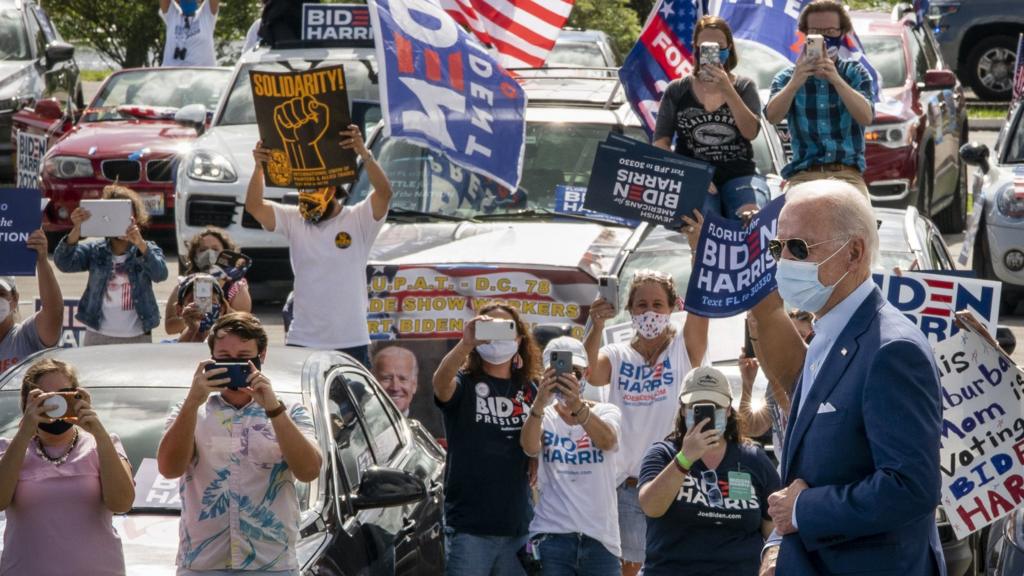 Democratic presidential nominee Joe Biden arrives at a drive-in campaign rally in Florida