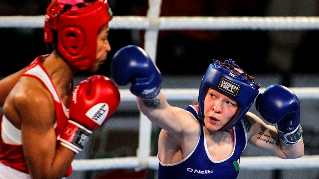 Ireland’s Amy Broadhurst on her way to winning against Leonie Muller of Germany