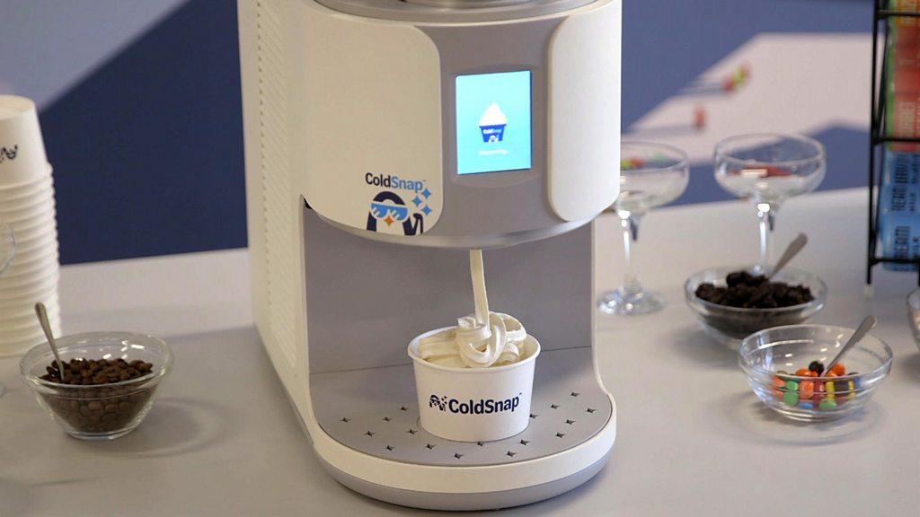 An ice cream being dispensed into a cup from a ColdSnap machine