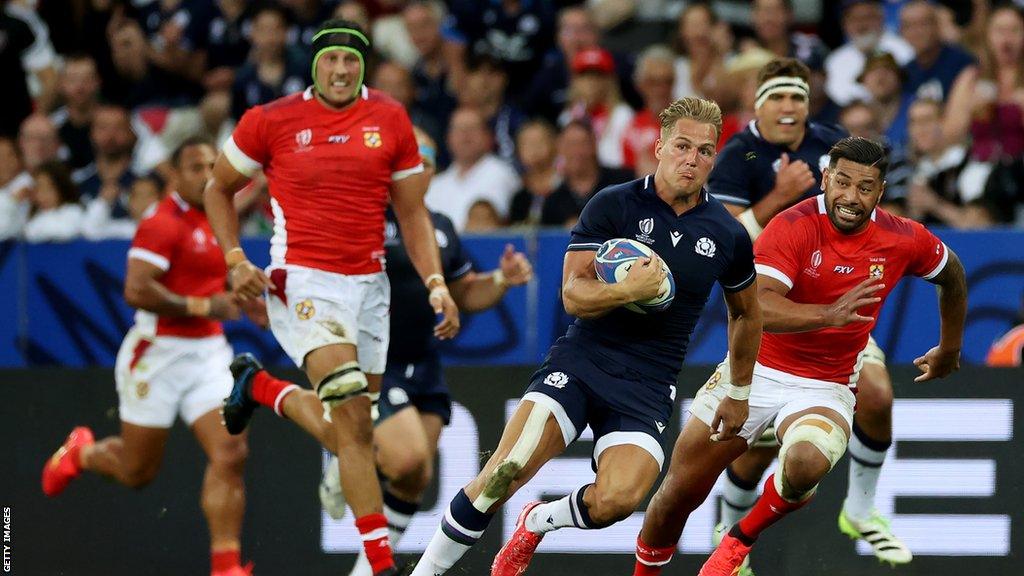 Duhan van der Merwe runs with the ball during Scotland's win over Tonga