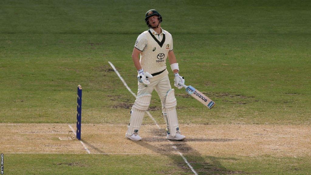 Australia's Steve Smith looks disappointed as he is dismissed against Pakistan