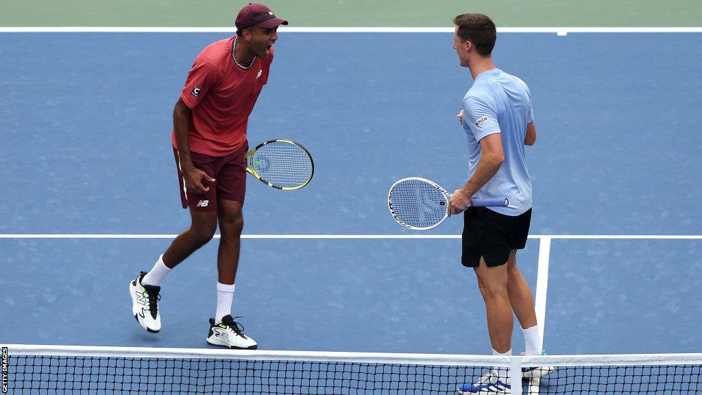 Rajeev Ram of the United States and Joe Salisbury of Great Britain celebrate after defeating Ivan Dodig of Croatia and Austin Krajicek of the United States