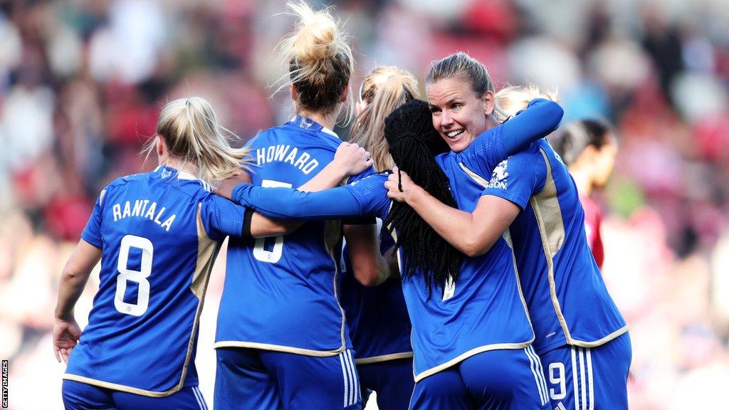 Players of Leicester City celebrate after Aileen Whelan (hidden) of Leicester City scores