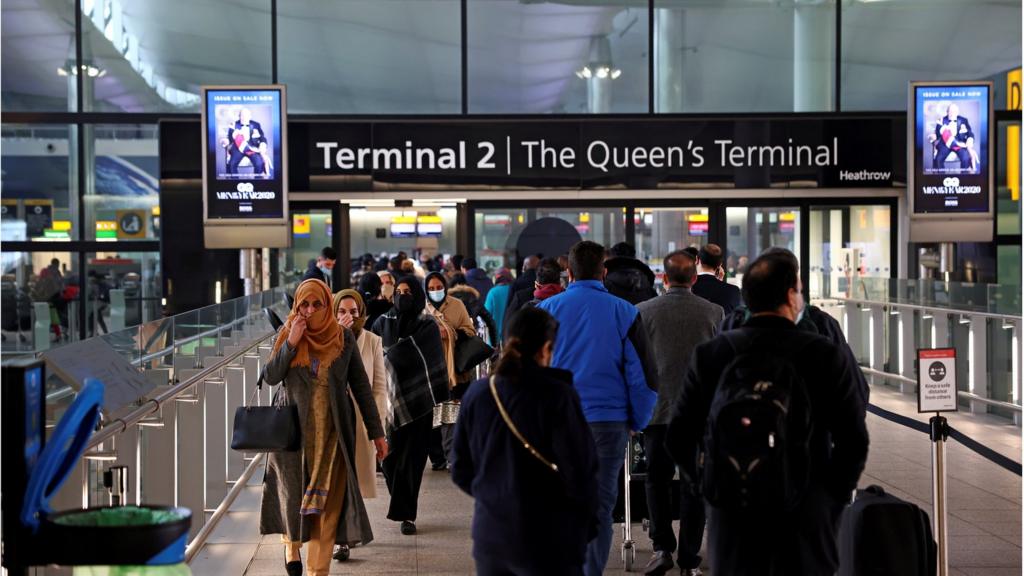 Travellers at Heathrow Airport