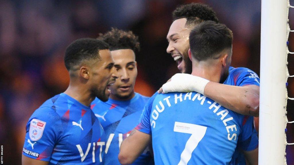 Stockport celebrate scoring against Colchester