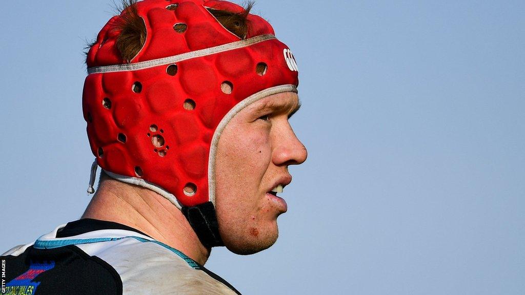 Sam Cross stands in his scrum-cap midgame for Ospreys