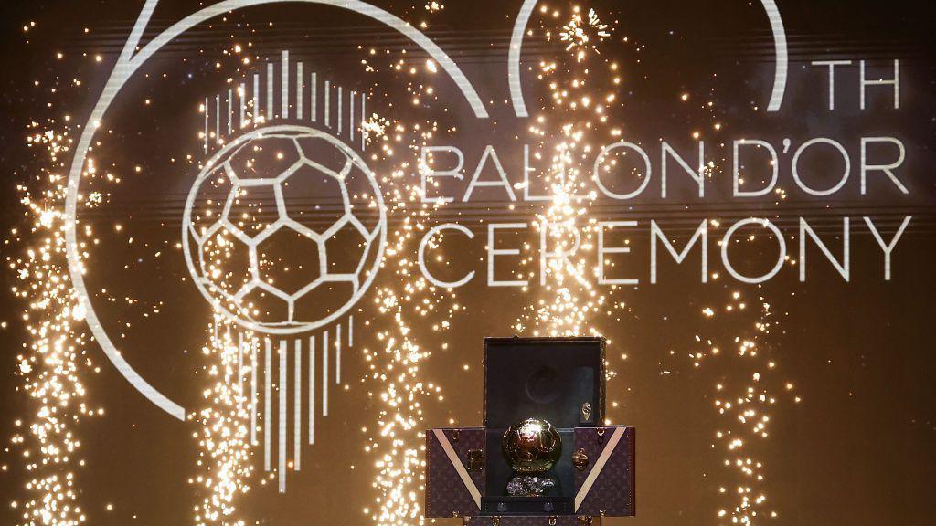 Ballon d'Or trophy on stage.