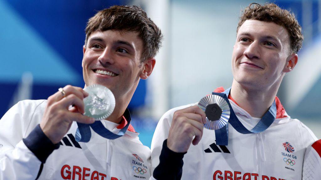 Tom Daley and Noah Williams show off their silver medals 