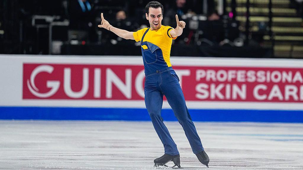 Tomas skating in his yellow minion outfit
