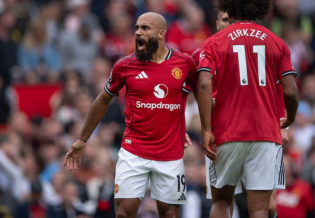 Bryan Mbeumo celebrates in a Manchester United shirt