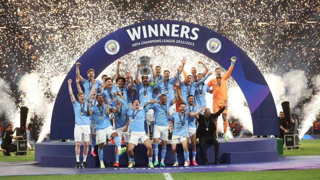 Manchester City lifting the Champions League trophy in 2023