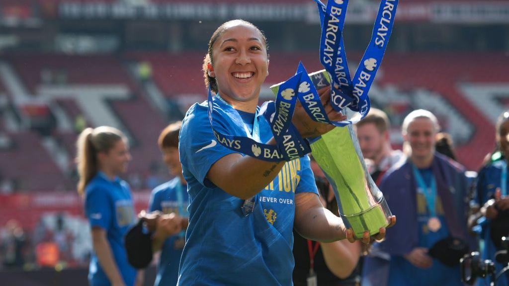 Lauren James lifting the WSL trophy with Chelsea last season