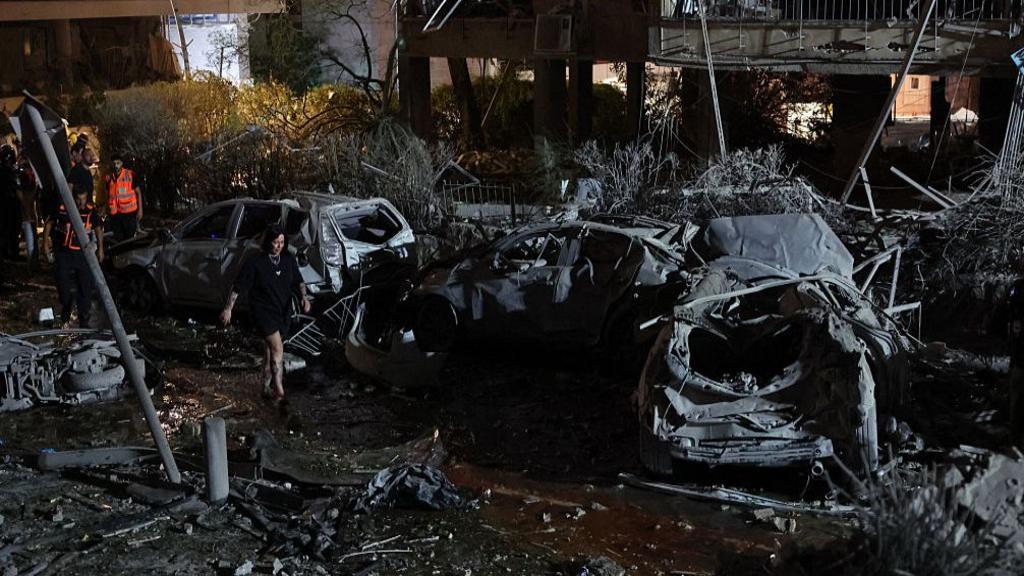 Iran retaliates with missile attacks on Israel, as Netanyahu urges Iranians to stand up to regime
