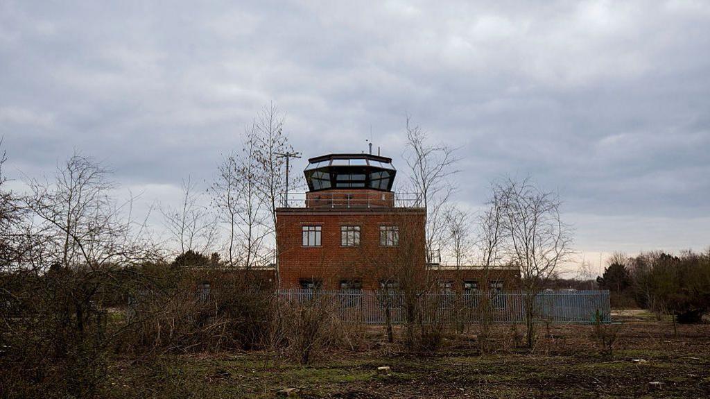 The former Control Tower near the 'Ground Launched Cruise Missile Alert and Maintenance Area' at the former Greenham Common air base. There is a lot of wildlife in the area.