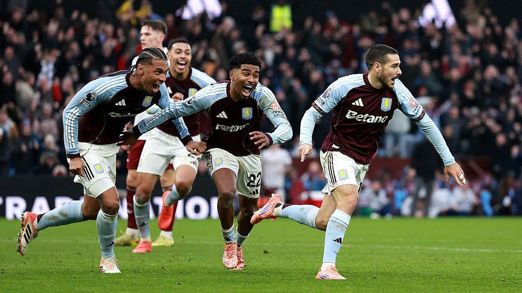 Emi Buendia and team-mates celebrate scoring