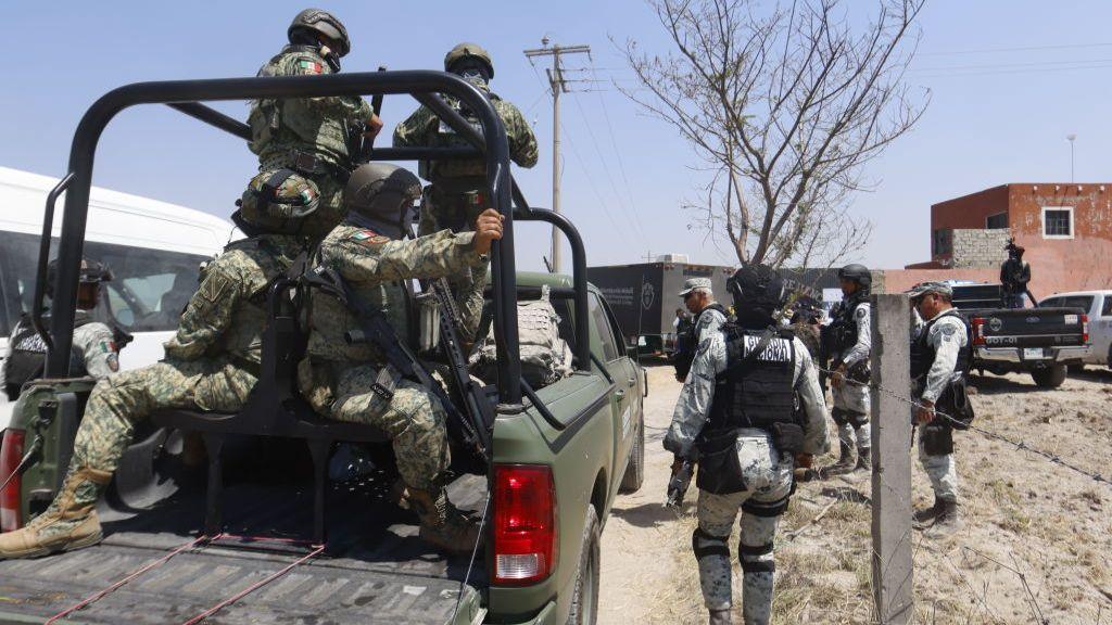 Agents from the Jalisco prosecutor's office investigate an alleged drug ranch in Teuchitlan, Jalisco, Mexico on 20 March 2025.
