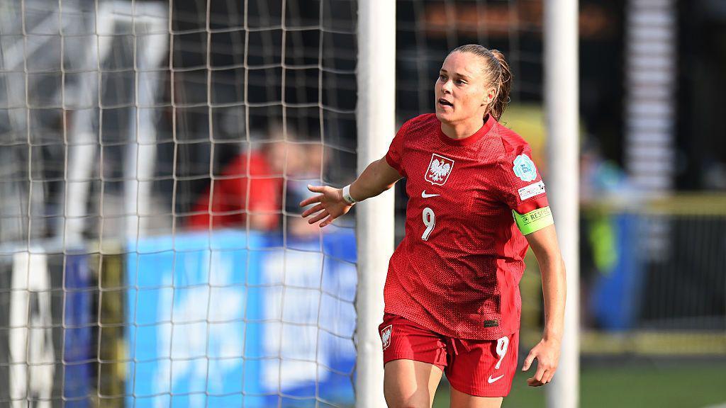 Ewa Pajor celebrates scoring