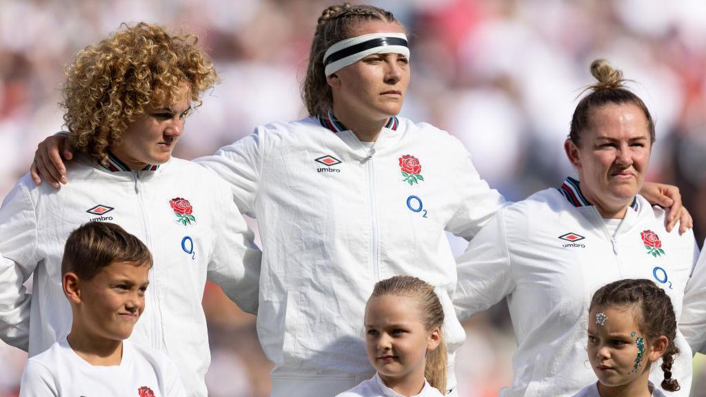 Zoe Aldcroft with Ellie Kildunne and Marlie Packer