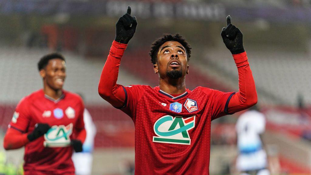 Angel Gomes celebrating a goal he scored for Lille