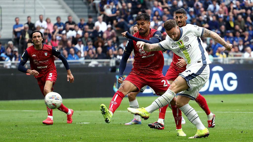 Marko Arnautovic shoots and scores for Inter against Cagliari in Serie A