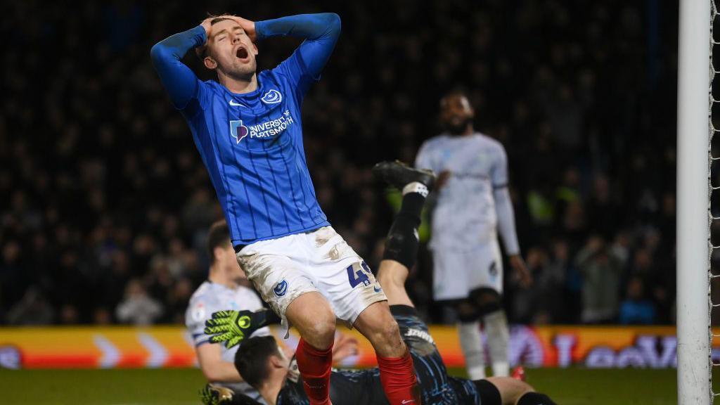 Callum Lang of Portsmouth reacts after a missed chance during the Championship match between Portsmouth FC and Millwall FC