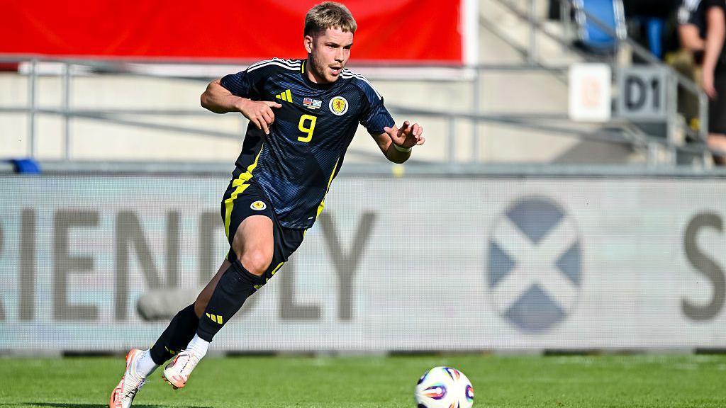 George Hirst in action for Scotland against Liechtenstein
