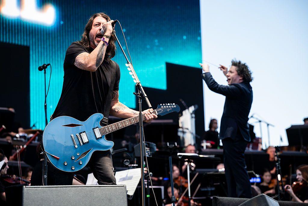 Dave Grohl sings with the LA Philharmonic on stage at the Coachella Festival this April