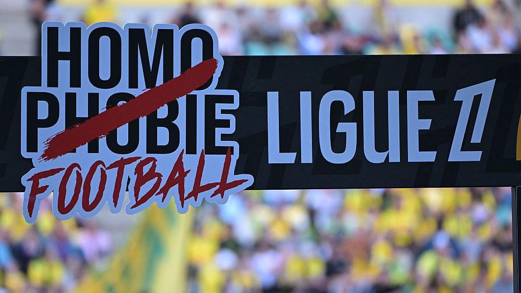 An anti-homophobia banner is displayed prior to the French Ligue 1 football match between FC Nantes and Montpellier Herault SC at the Stade de la BeaujoireLouis Fonteneau in Nantes