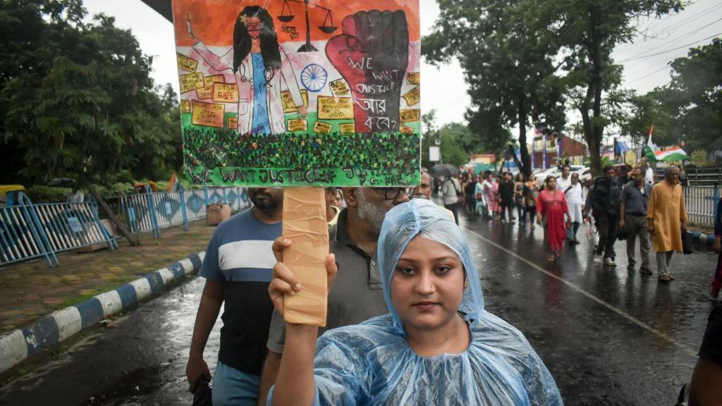 Citizens march along a street during a protest condemning the rape and murder of a trainee medic at a government-run hospital in Kolkata, India, on September 15, 2024. (Photo by Sudipta Das/NurPhoto via Getty Images)