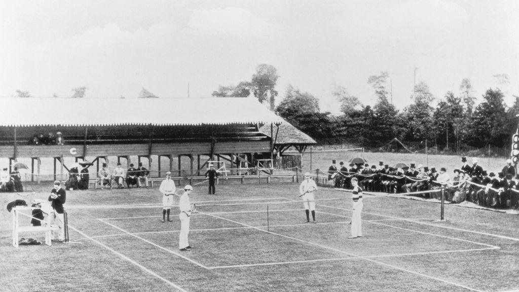 A photo of the first international tennis match at Wimbledon in 1883.