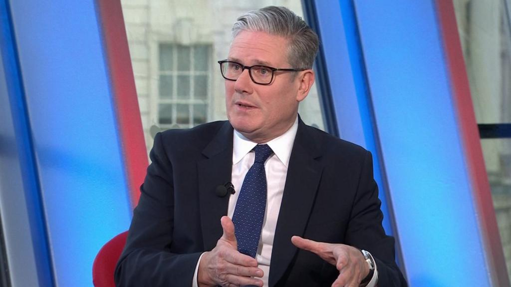 Keir Starmer gesturing while talking in a TV studio