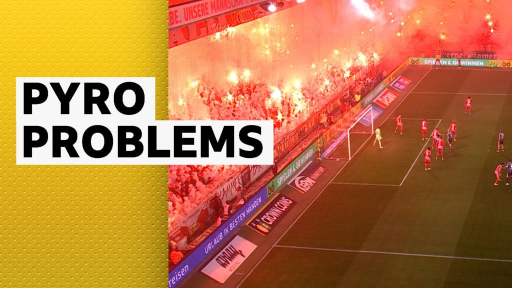 Fiery scenes in stands halts Bundesliga match