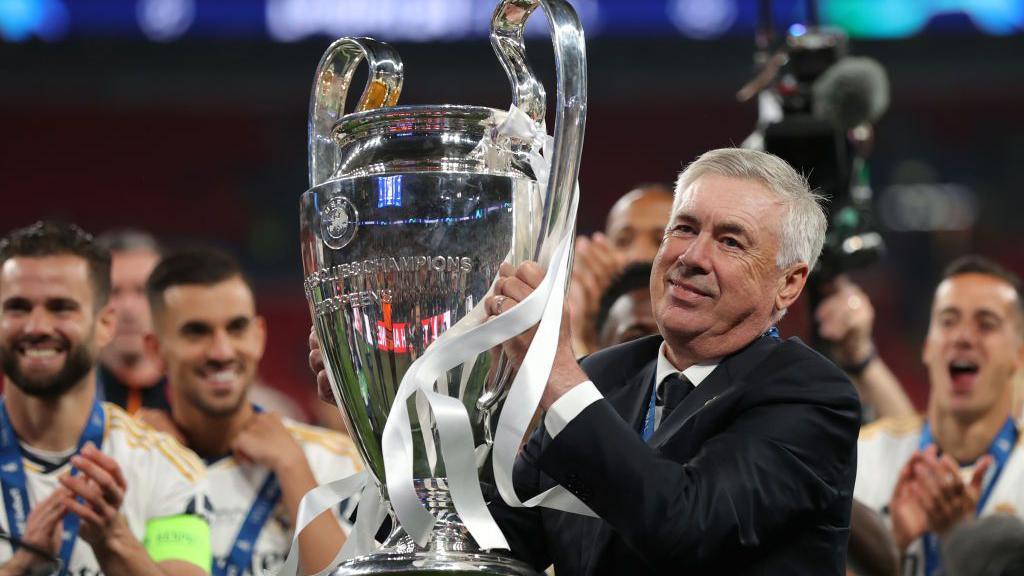 Carlo Ancelotti lifting the Champions League